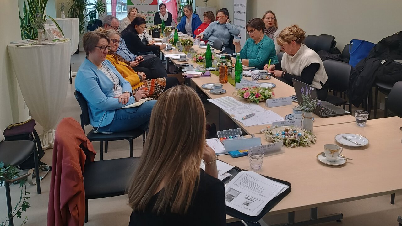 Teilnehmende einer Sitzung